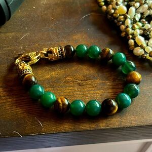 bracelet brand is cxx new w tag attached but no price tag. estate item